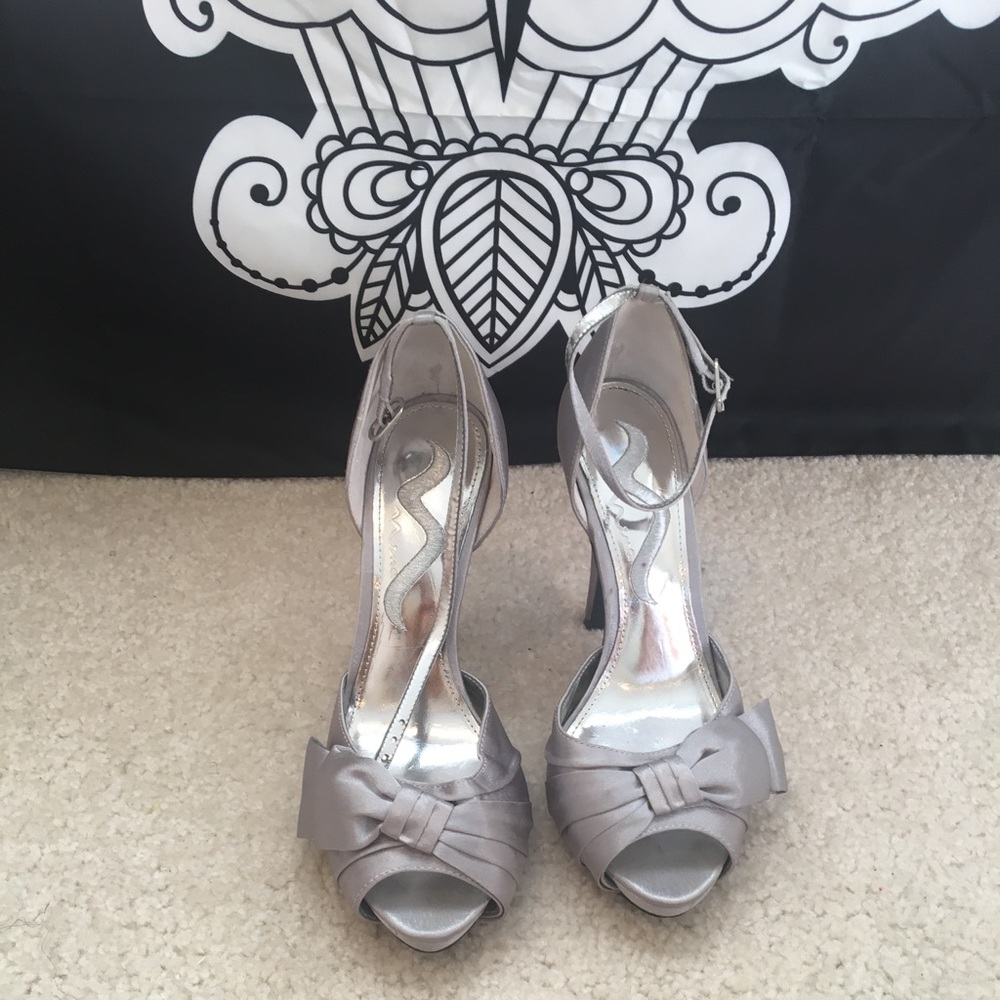 Silver heels with bow